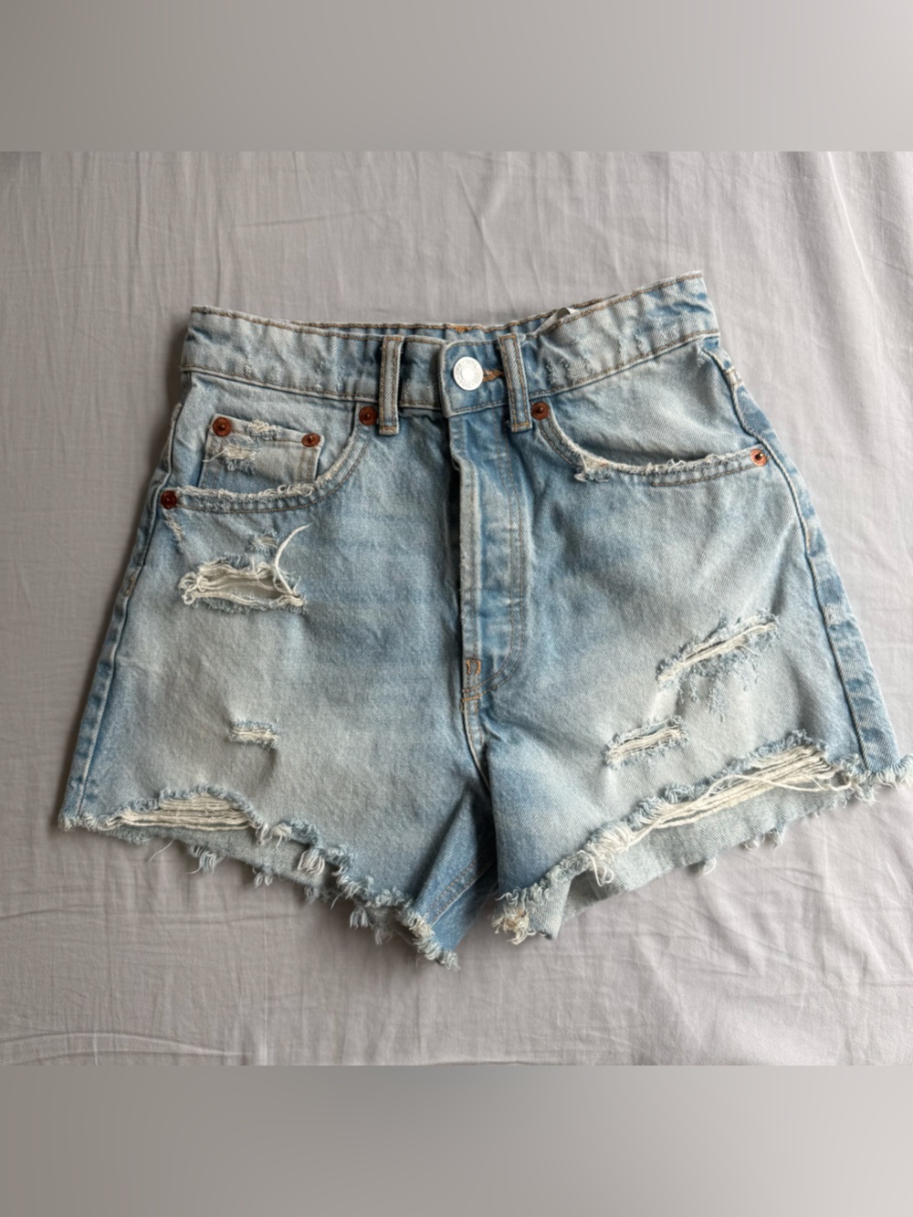 Zara Light Blue Distressed Denim Shorts